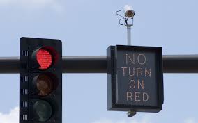 How to Tell If a Stop Light Has a Camera?
